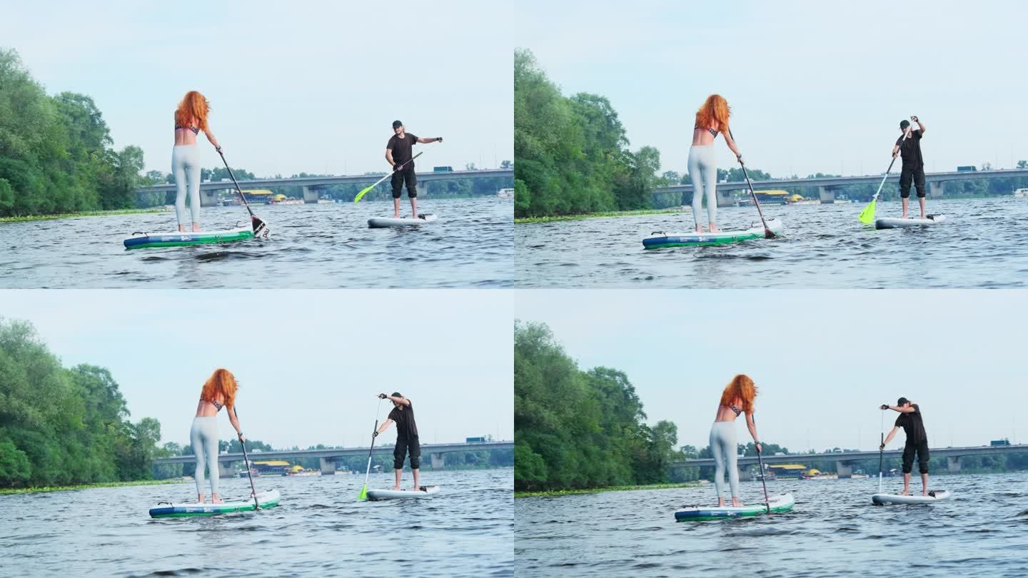 女士和先生在暑假期间在湖上享受水上运动
