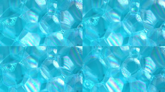 魔术壁纸，魔术香皂宏观结构。蓝色泡沫肥皂与气泡，旋转抽象的背景。彩色肥皂泡沫与弹出的气泡背景。抽象大