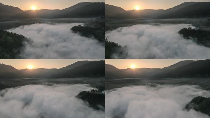 山谷里的云雾被日出照亮了