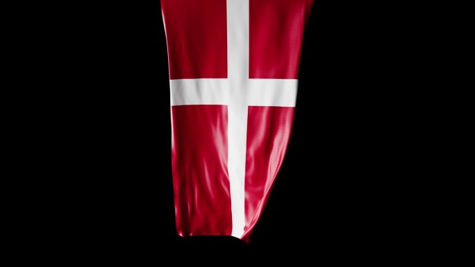 丹麦国旗卷成圆柱形，旋转时展开并起伏