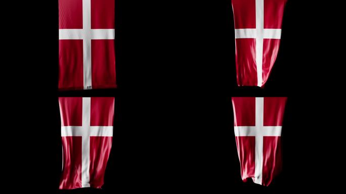 丹麦国旗卷成圆柱形，旋转时展开并起伏