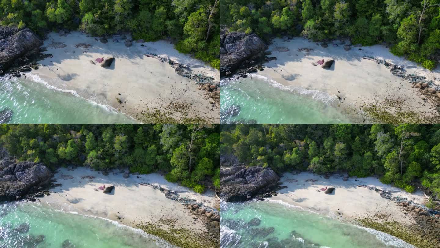 岩石孤独沙滩koh lipe岛泰国。伟大的空中俯瞰飞行无人机从上面拍摄的镜头
4 k的片段