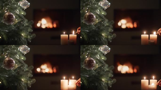 一只手拿着火柴点燃了圣诞树附近的蜡烛，背景是燃烧的壁炉。圣诞夜