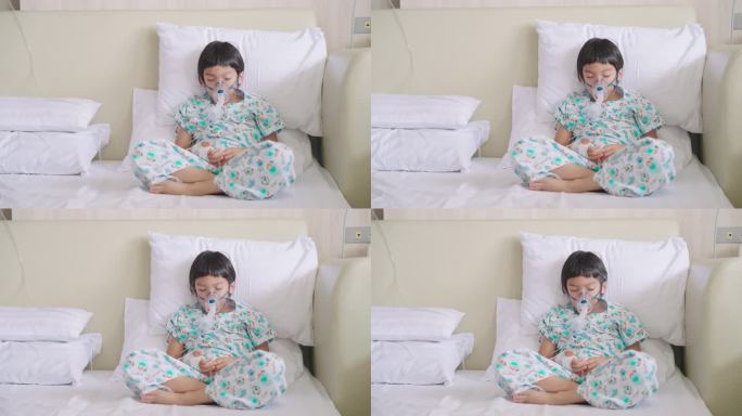 亚洲病人男孩独自戴着吸入器面罩睡觉
