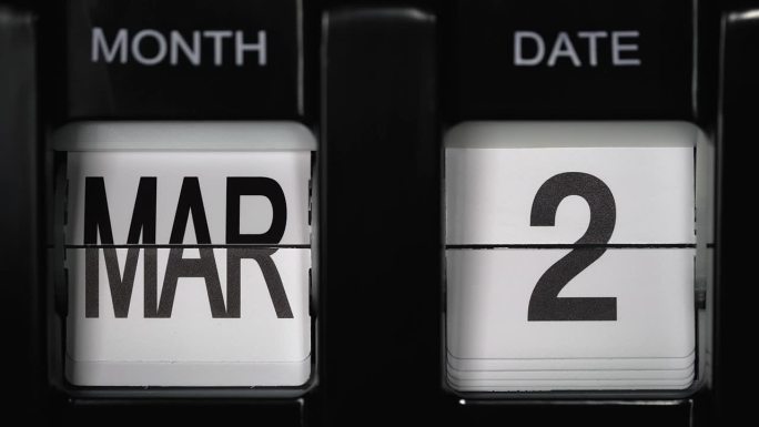 日期从3月2日更改为3月3日的复古翻转日历。关闭了。