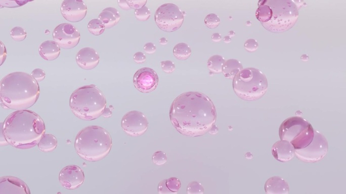 微距拍摄的各种粉红色的黄金泡沫在水上升在浅色背景。