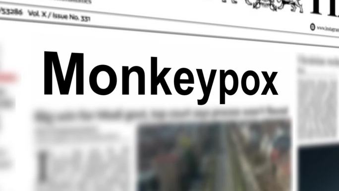 猴痘标题印刷在报纸上的概念。