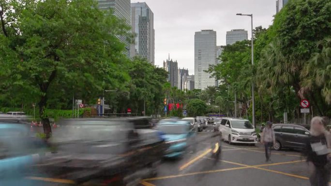 白天雅加达城市交通街道十字路口高峰时间全景4k延时印尼