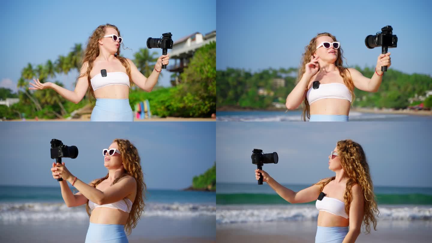 旅游影响者拍摄海滩视频与专业相机，无线湖泊麦克风。女博主海边风景，为关注者记录阳光海岸小贴士。内容创