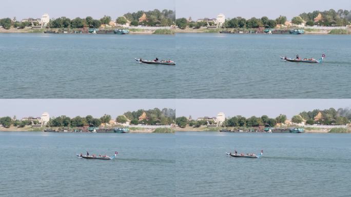 摩托艇载着渔民和渔网逆流而上