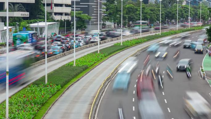 白天雅加达市区交通街道路桥顶部全景4k延时拍摄印尼