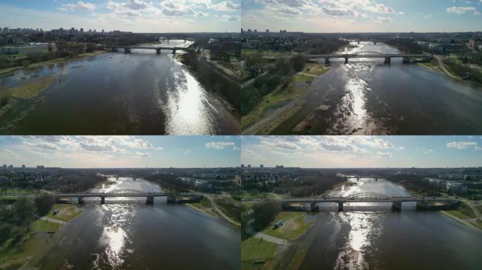 波兰波兹南春天水位上升时瓦尔塔河的城市景观。鸟瞰罗克大桥。