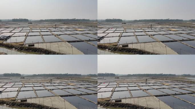 在孟加拉国的考克斯巴扎尔，盐农使用太阳能蒸发法生产原盐。盐种、盐收