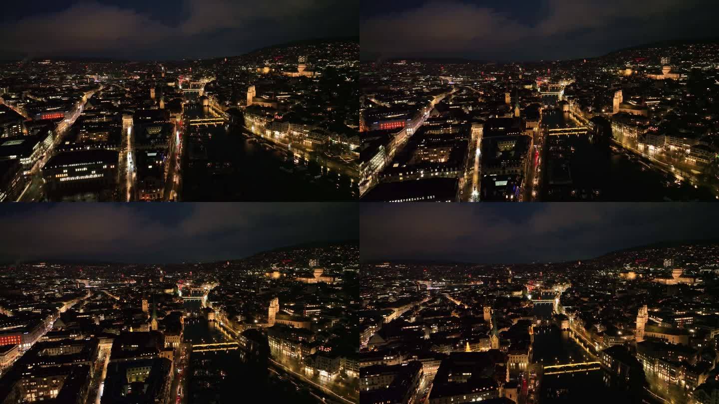 瑞士小镇美丽的夜景与城市景观和利马特河的高角度视图。