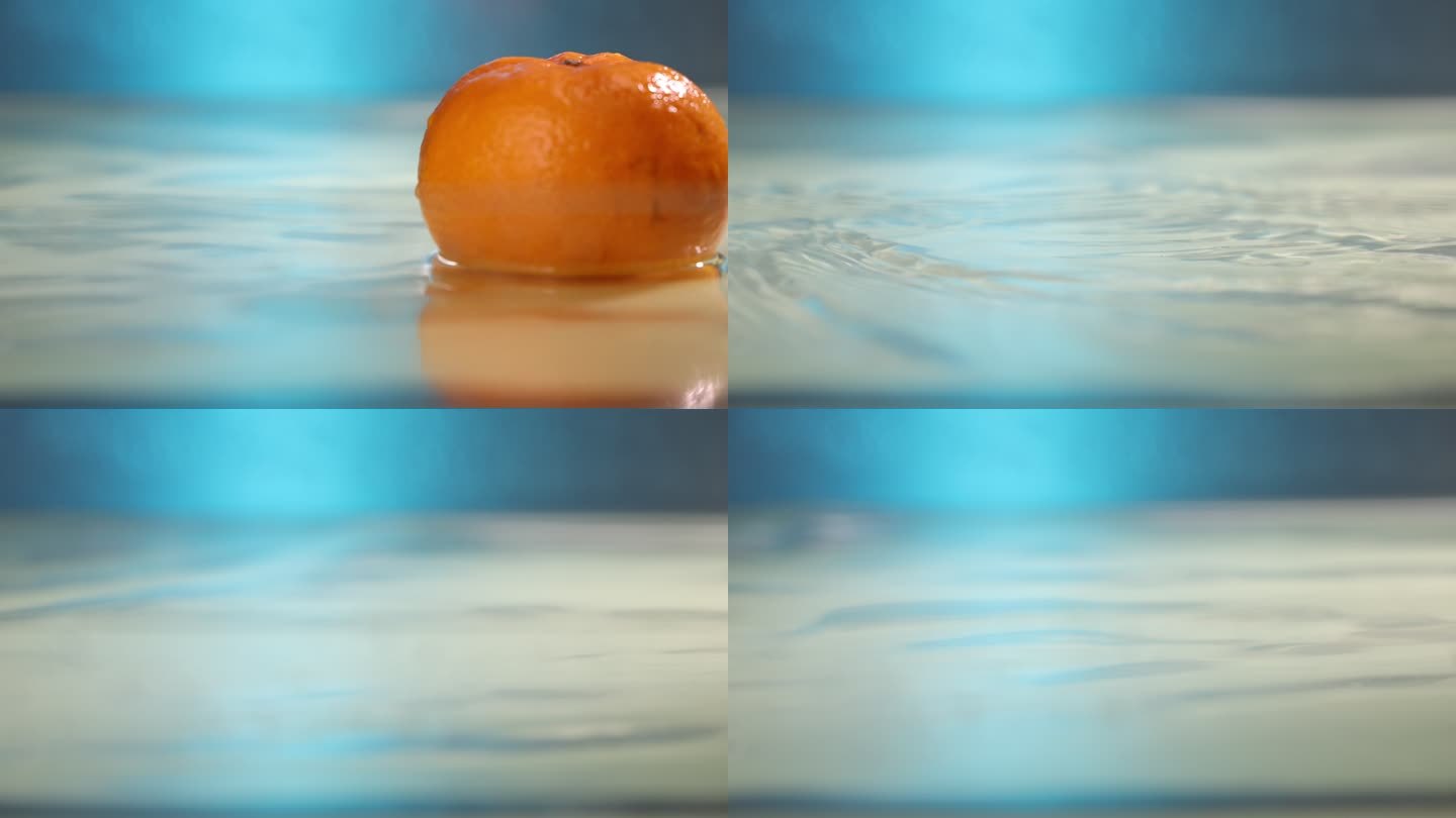 拿起水中的橘子高清实拍 升格