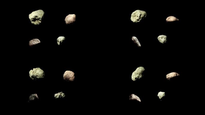 四颗小行星绕着它们的轴旋转，在黑色的背景上分开。一组4个旋转的小行星。4k慢动作视频。