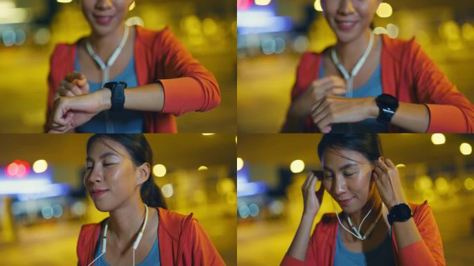 年轻的亚洲女运动员跑步者在城市夜间户外跑步前用智能手表查看进度，用耳机听音乐的特写。健康的锻炼。