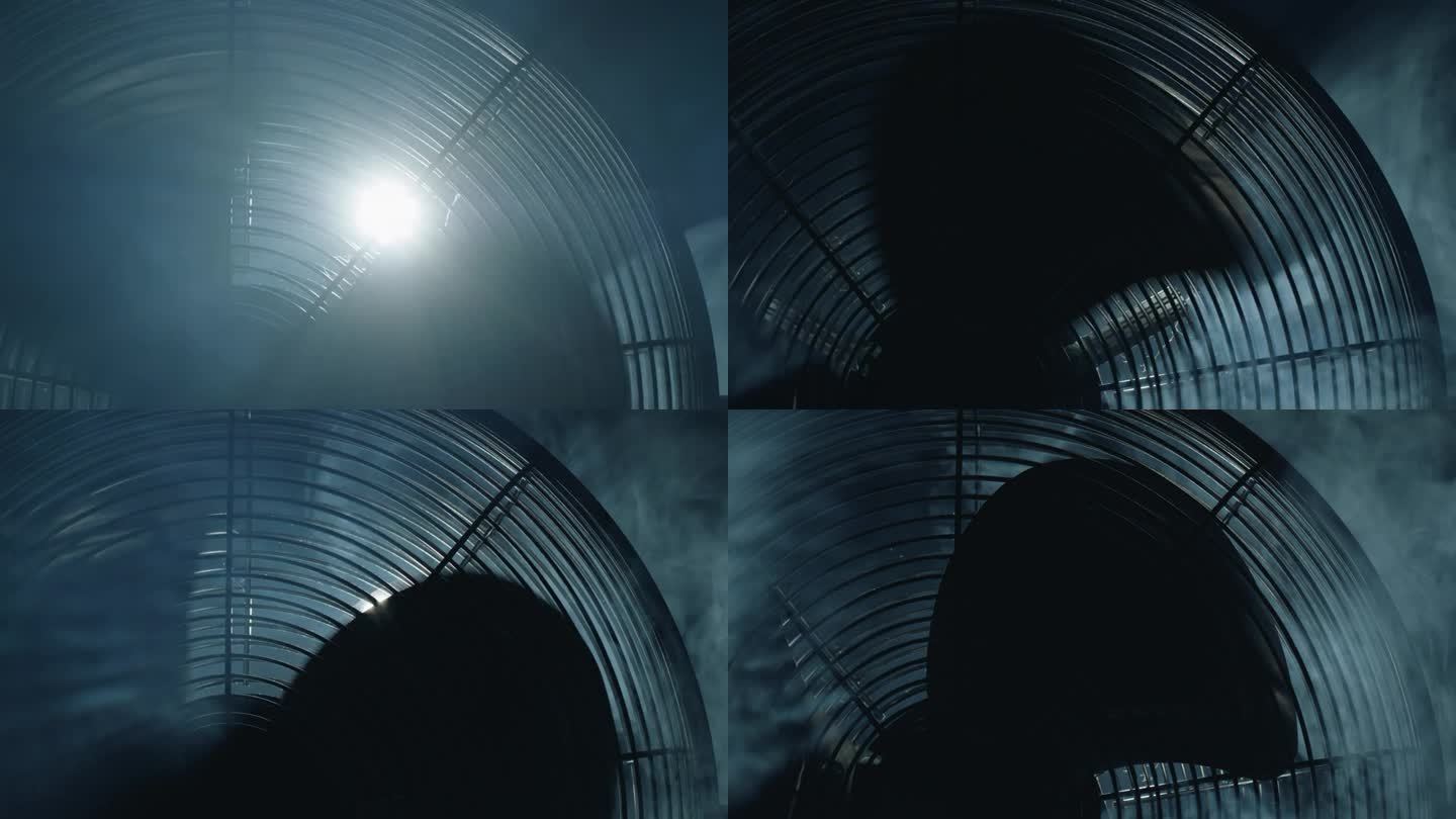 风扇叶片在光线和雾中旋转。特写镜头