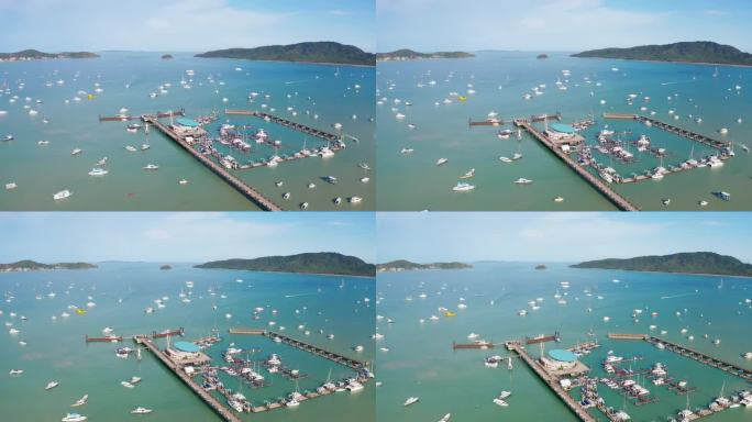 从空中无人机拍摄的夏龙码头海景，豪华游艇，游艇，帆船和渔船俱乐部，美丽的白天天空。