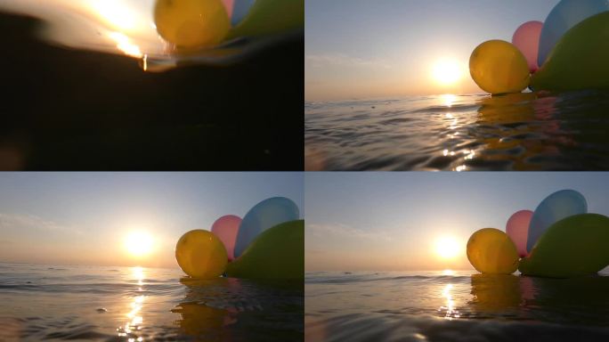 在一个阳光明媚的夏日，一束五彩缤纷的气球在海浪上摇摆。清晨，黄昏，日落，黎明，许多彩色的小气球绑在一
