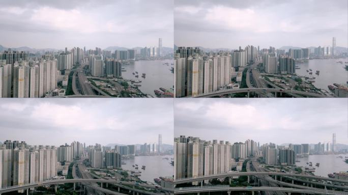 夏日城公路鸟瞰图及通往美丽小镇的汽车路线。亚洲人迁往繁忙的金融之都香港。飞越香港十字路口香港4k