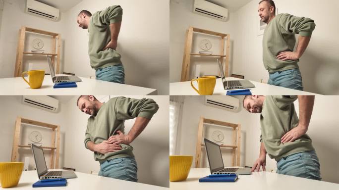 一名男子在使用笔记本电脑时背部和臀部疼痛。