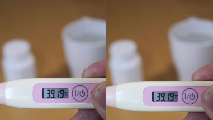 在家用数字体温计测体温，高体温，发烧，高热，自我监测，健康医疗概念，慢动作，4k