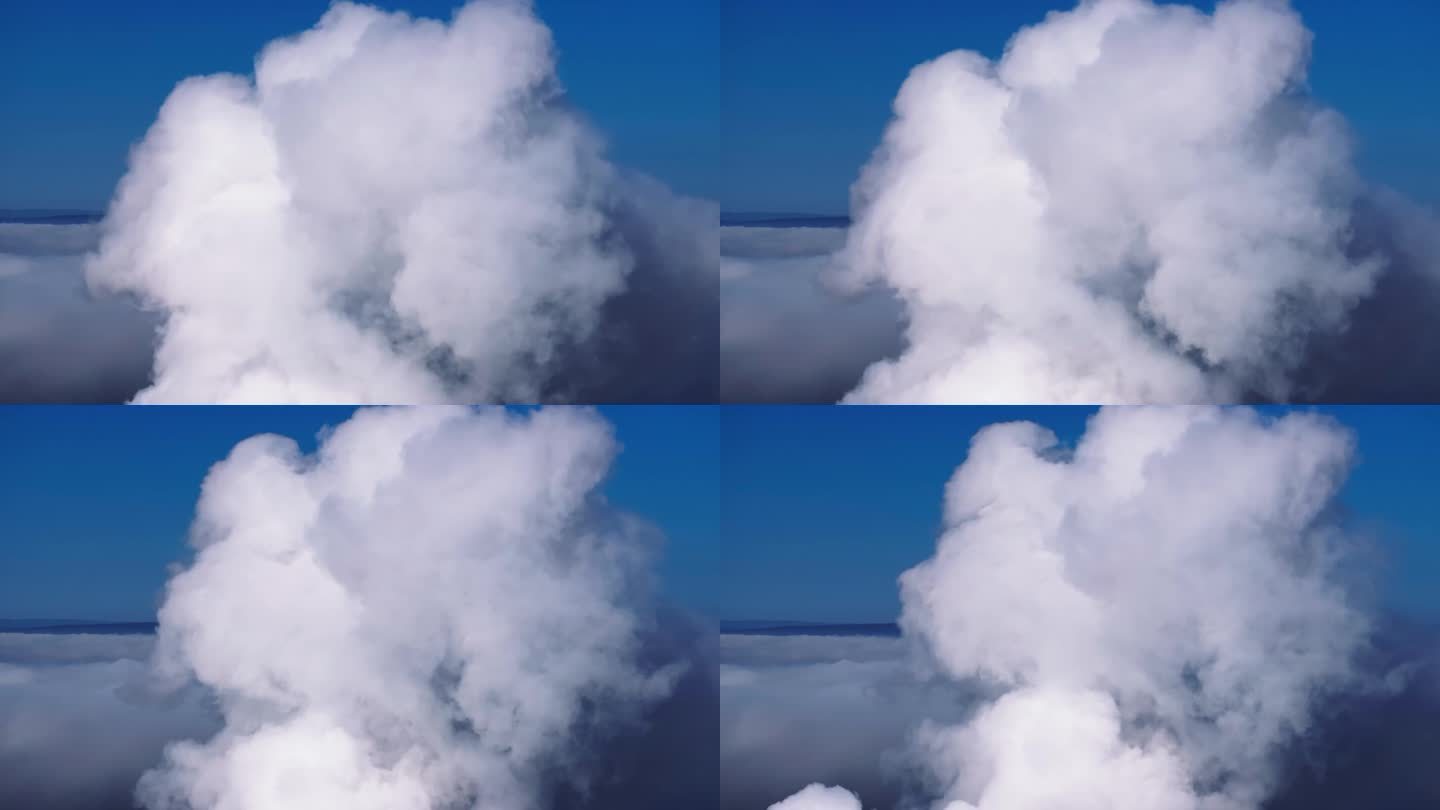 无人机拍摄到一团白烟从工业设施中冒出来，在蓝天中翻滚