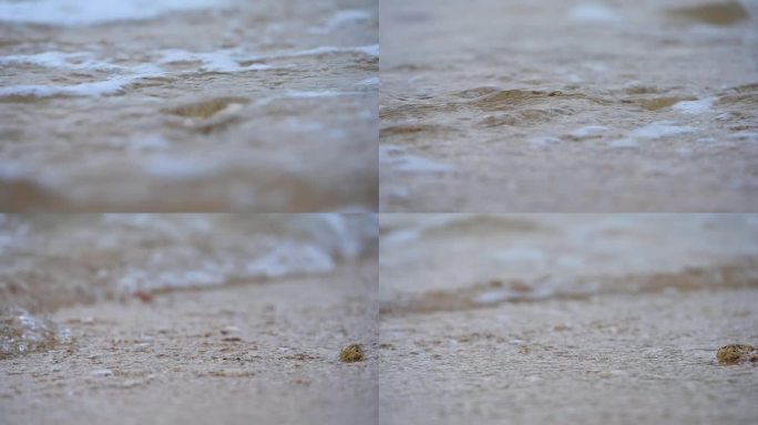 大海海浪浪花冲刷沙滩升格慢镜头特写