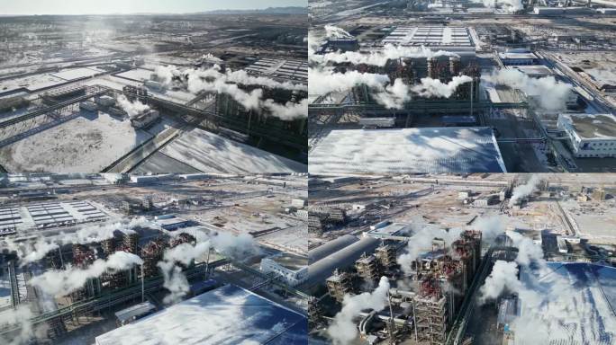 冬天白雪覆盖的化工厂烟筒冒着白烟污染