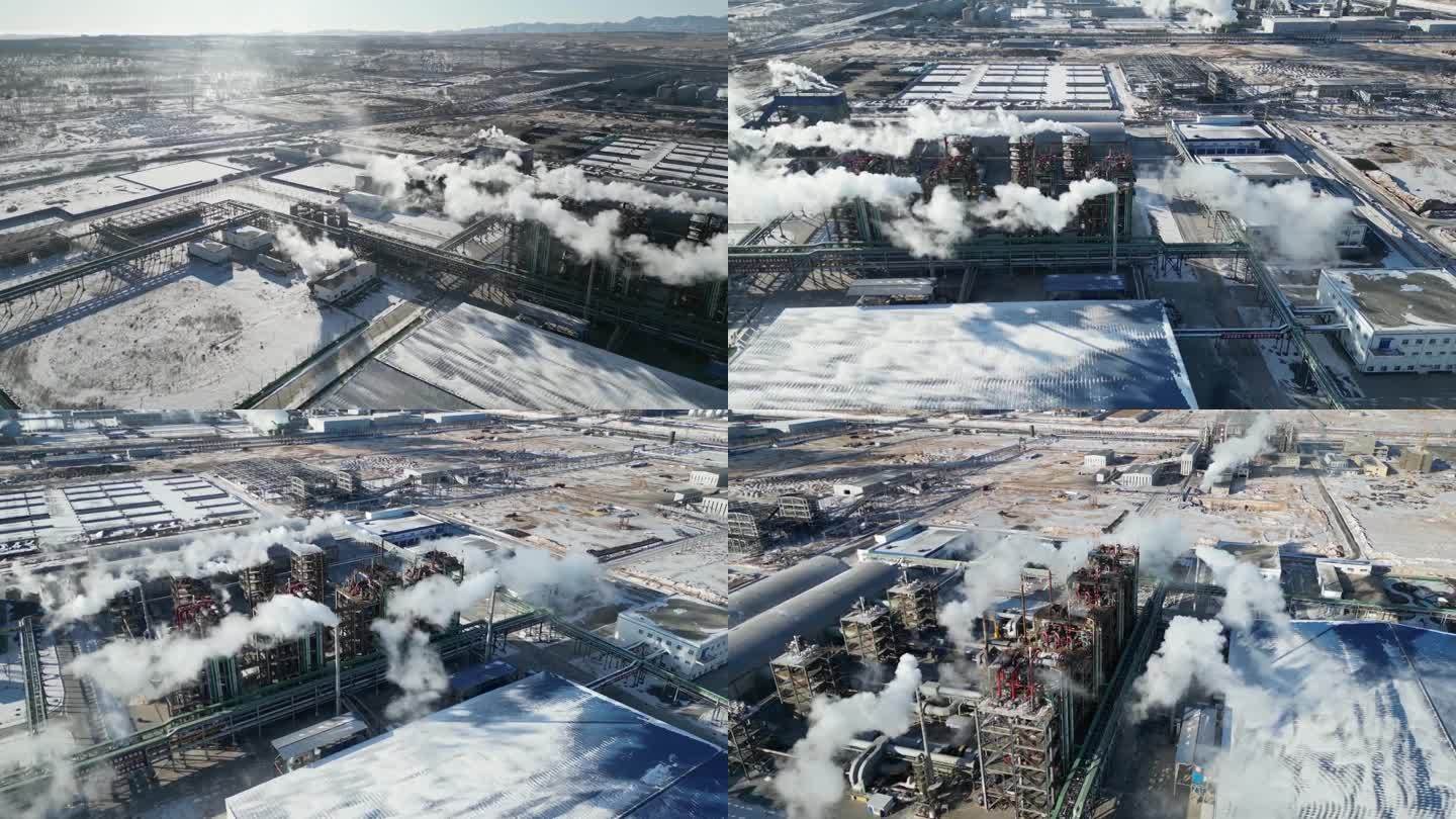 冬天白雪覆盖的化工厂烟筒冒着白烟污染