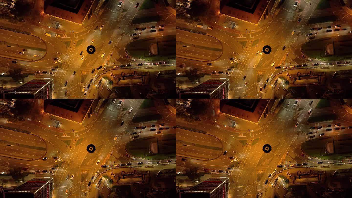 夜间照明斯图加特市中心交通街道十字路口空中俯视全景4k德国