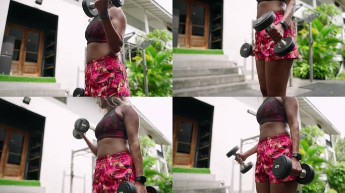 健身女性在户外健身房用哑铃练习二头肌卷曲，热带环境专注于身体塑造，锻炼积极的生活方式时尚的运动服动态