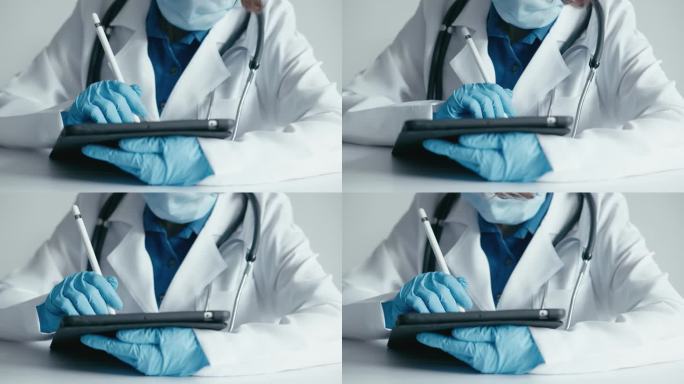 在线健康:女医生积极在触摸屏上书写，分析医疗指标。医疗技术的作用:医生在触摸屏上仔细输入数据，确保诊