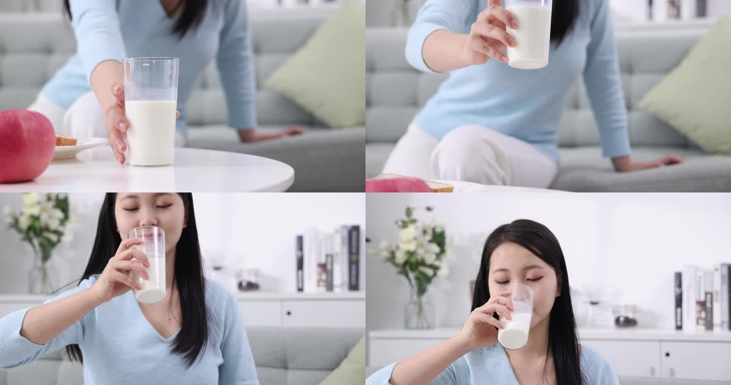 一位年轻女士在家喝牛奶