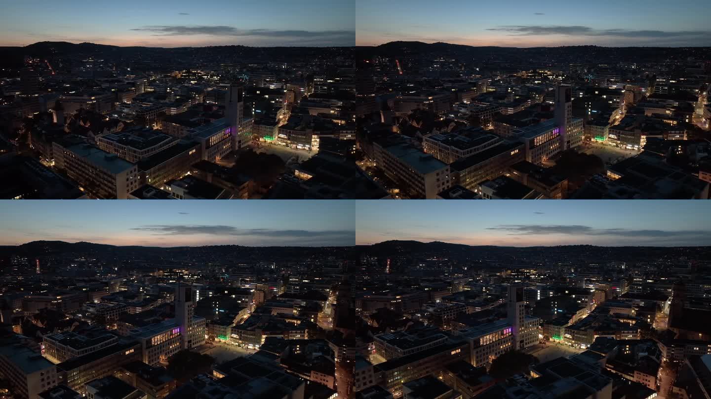 暮色照明斯图加特市政厅中央广场航拍全景4k德国