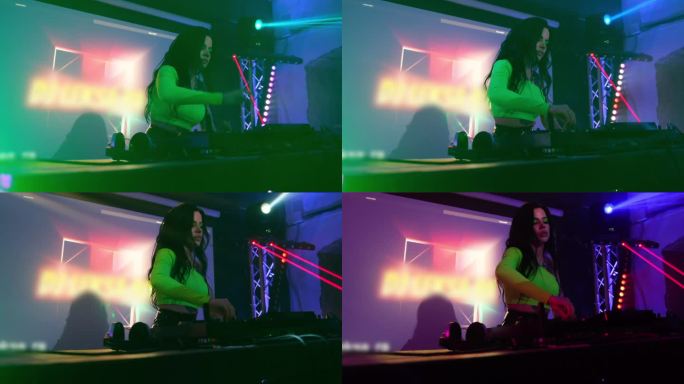 美丽，性感的女孩DJ播放音乐混合在一个夜总会