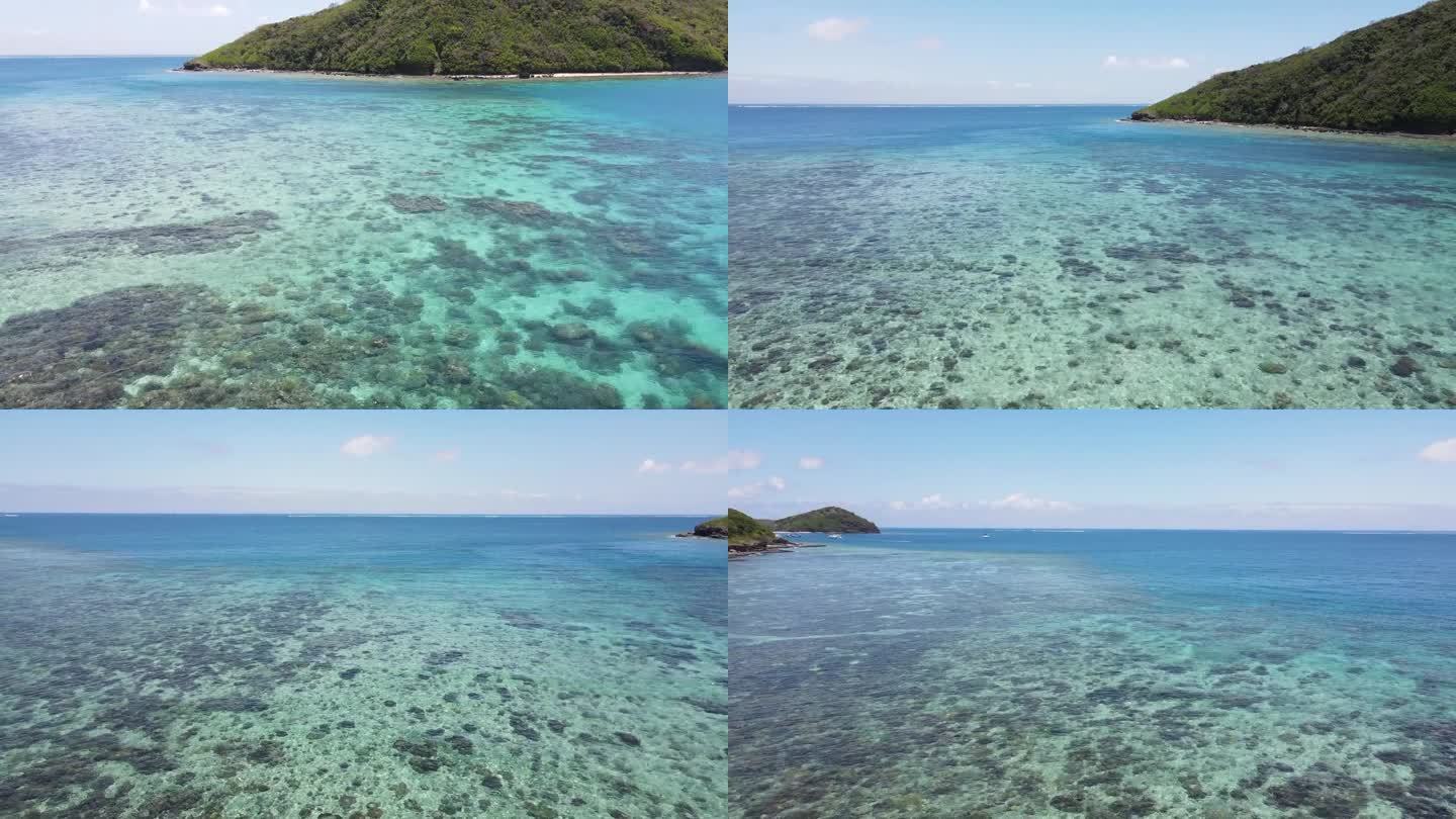 无人机接近德拉瓦卡通道。清澈的海水和珊瑚区赋予了这个地方一种神奇的气氛，这个地方位于Yasawa群岛