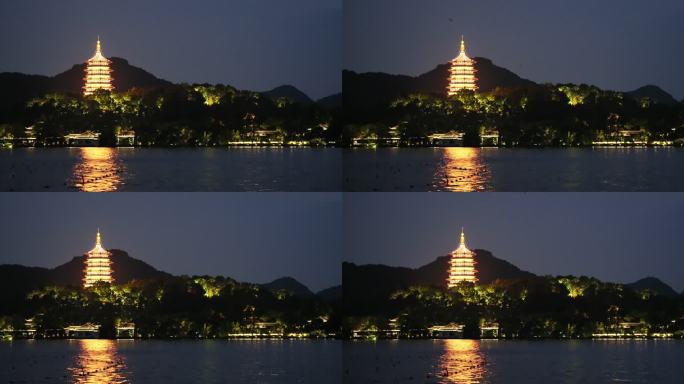 中国浙江杭州的雷峰塔和西湖的夜景倒影