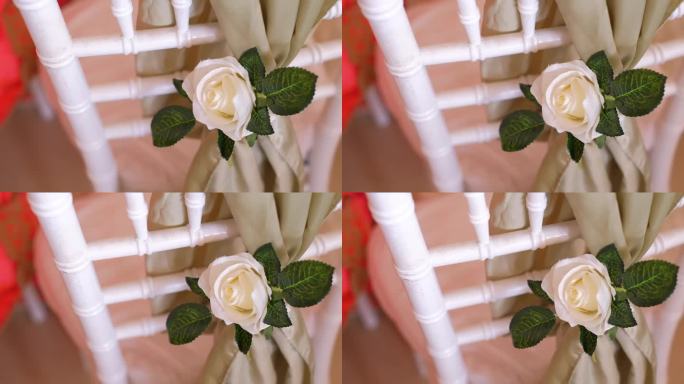 婚宴上木椅上的花朵装饰。高角度拍摄