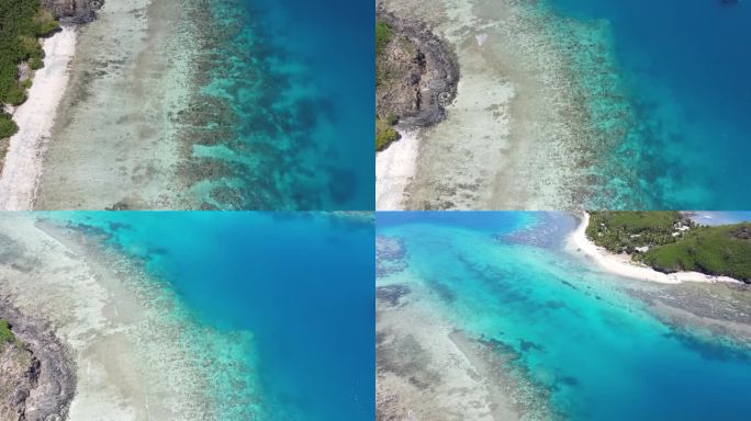鸟瞰天堂海滩，海岸和珊瑚礁在一个热带海湾与绿松石水。度假目的地在田园诗般的岛屿德拉瓦卡，斐济，太平洋