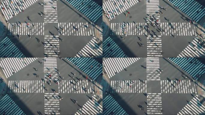 人群穿过斑马线，东京，日本