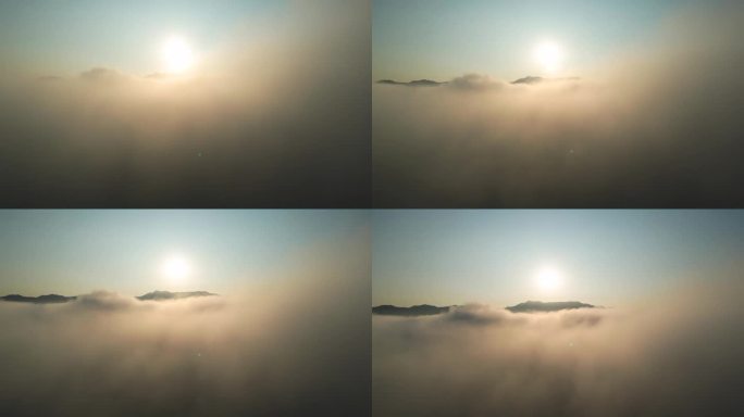 云雾在天空中移动，日出与山