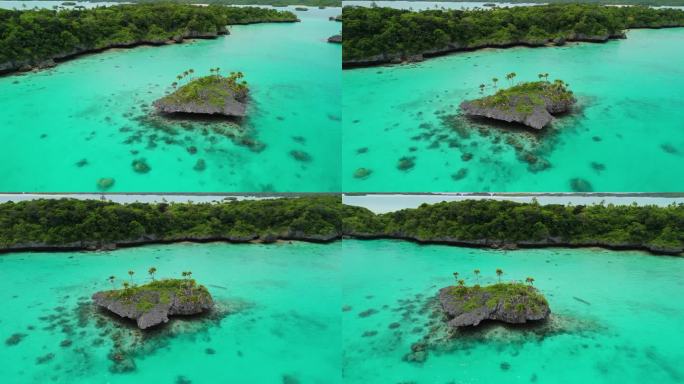 电影般的无人驾驶飞机在斐济被天然泻湖环绕的偏远岩石岛飞行