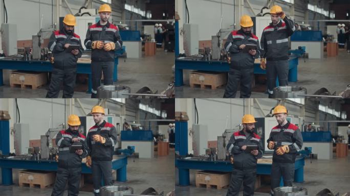 男性工厂工人在盘点时观察机器细节
