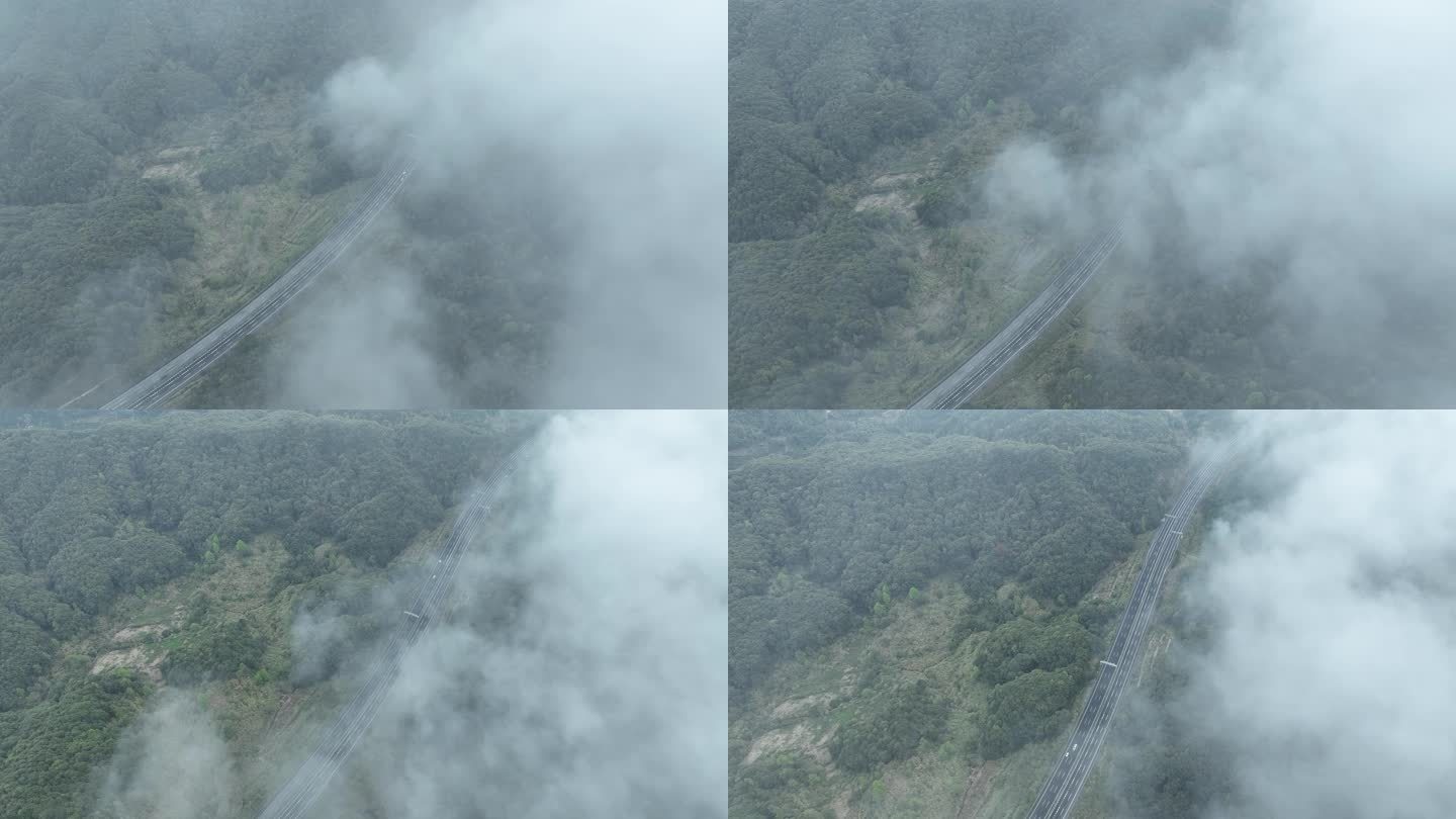 云雾下的高速公路俯拍森林公路云雾缭绕山区