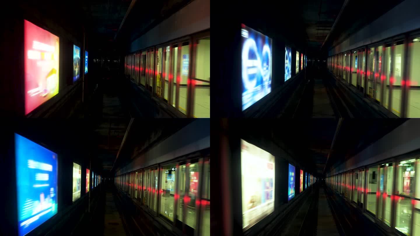 地铁列车从现代化地铁站驶出隧道内加速行驶