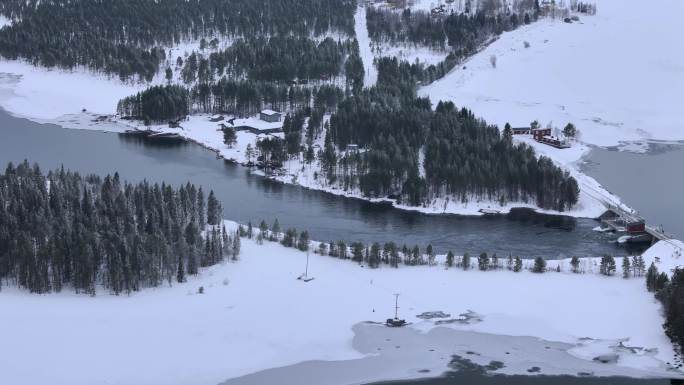 北欧白雪茫茫的湖泊河流水电站