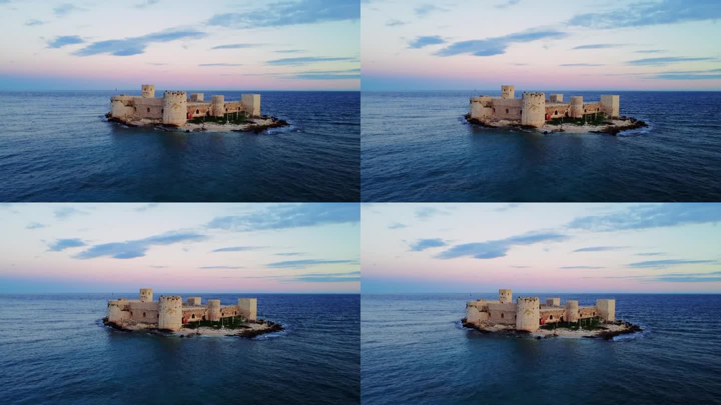 在航拍镜头中见证令人惊叹的基兹卡莱西:日落时分，地中海沿岸梅尔辛的一座12世纪拜占庭城堡遗址。体验基