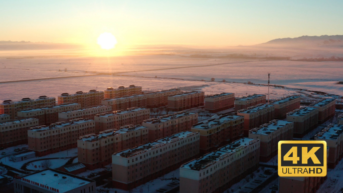 新疆昭苏冬季城市雪山航拍日出日落0020